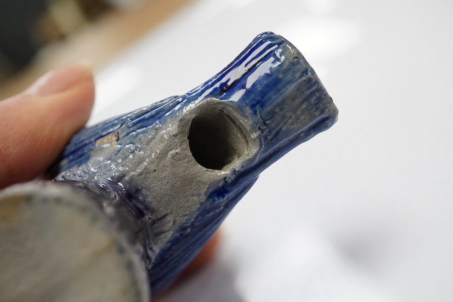 A German Rhenish stoneware songbird whistle, glazed in blue and grey, 9cm high. Condition - good